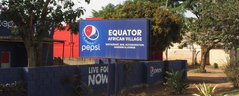 roadside sign for the Equator restaurant