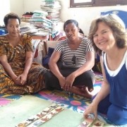 three women working with teaching material